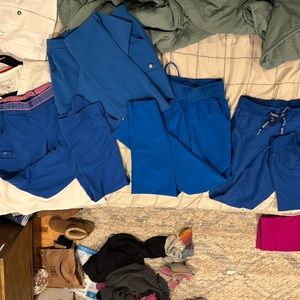 Lots of Royal Blue scrub bottoms. figs. Med Couture. Dickies. All XSP